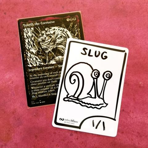 The Magic card "Toxrill, the Corrosive" with an InfiniTokens dry erase token on top. The token says "Slug" and has Gary the Snail drawn on it.