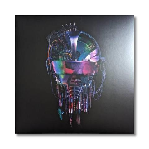 This is the album cover for The Alchemist’s Euphoria by Kasabian. It features a futuristic, cybernetic helmet with an iridescent metallic sheen in shades of purple, blue, and pink. The design blends technology and creativity, with wires, cables, and paintbrushes hanging from the bottom. The dark background enhances its striking, sci-fi aesthetic.
