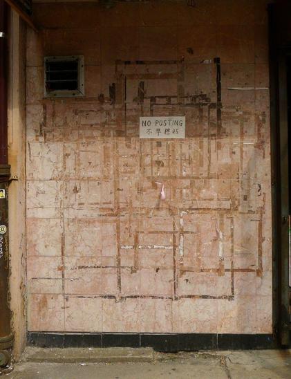 post on walls: photograph of an outside wall with a small barred window. A written sign says "NO POSTING" in English and Chinese. Photo attribution: Flickr user pierrelaphoto