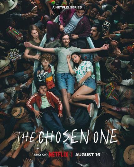 Affiche de la série "The Chosen One". Sur une barque tenue par plein de personnes : un garçon étendu sur le dos les bras tendus sur les côtés. À côté de lui une fille et un garçon qui tient une caméra. Un autre garçon est couché dans le fond de la barque et un autre à l'avant.