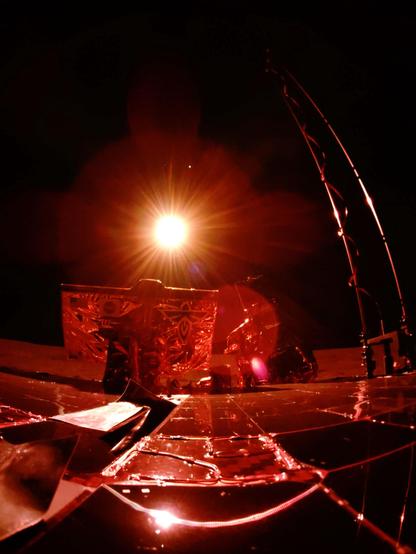 Solar Eclipse photo where the Blue Ghost lander turns red.