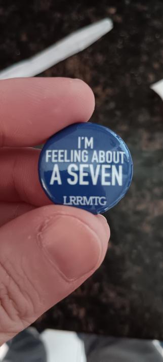 LRRMTG pin reading "I'm feeling about a seven".