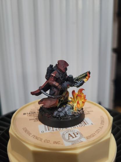 Right of priest with flamethrower