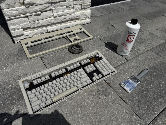 Getting ready to retrobrite - keyboard taken apart.