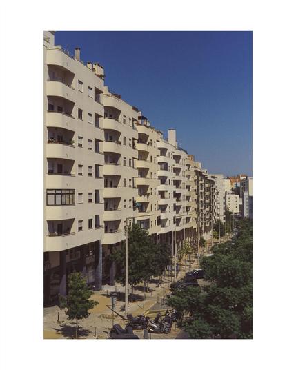 big structure of a terraced house in lisbon in stringent order