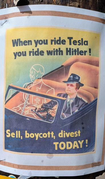 Mock golden age illustration of the spirit of Hitler riding with Tesla's scummy stain of a CEO with text: "When you ride Tesla you ride with Hitler! Sell, boycott, divest TODAY!"