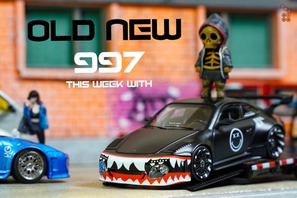 A Old & New 997, Matte Black by Tarmac Works in 1:64 scale with 1:64 figures on AREA 164