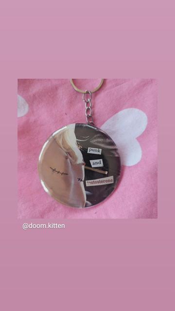 Button with text written "punk and testosterone" by @doom.kitten