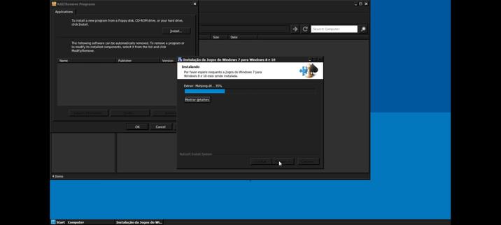 A imagem mostra a área de trabalho do Winlator rodando num celular Android. No centro da imagem há o instalador extraindo arquivos. O instalador em questão é dos jogos que vinha com o Windows 7.
