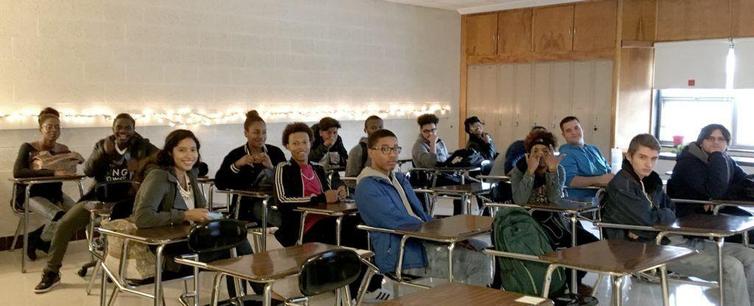 The hype and reality of personalized learning: a photograph of children sitting at desks in a classroom. Image attribution: edusurge