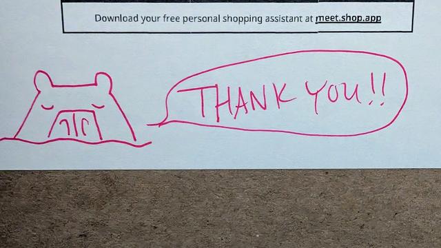 Photo of a drawing on packaging. A pink ink drawing of a capybara under water with a speech bubble to the right saying, "THANK YOU!!" Above is a rectangle with the text, "Download your free shopping assitant at meet.shop.app."