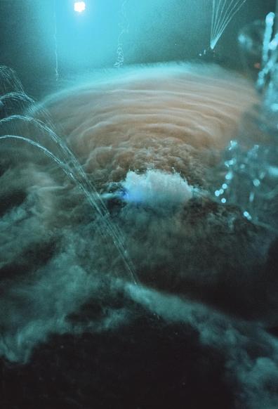 Smoke and water whirlpooling.