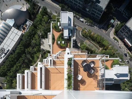 Habitat Qinhuangdao, a community housing complex, China
A pyramid-shaped profile gives access to the roof garden and sunny terraces with sea views for most of the flats.