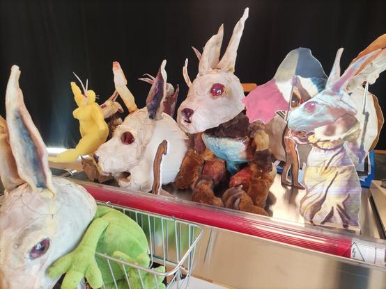 a collection of puppets with rabbit head