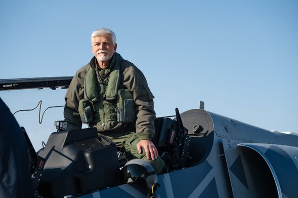 Earlier photo of the president (Pavel) visiting visiting a fighter jet factory. Pavel had a military career, he is a general.