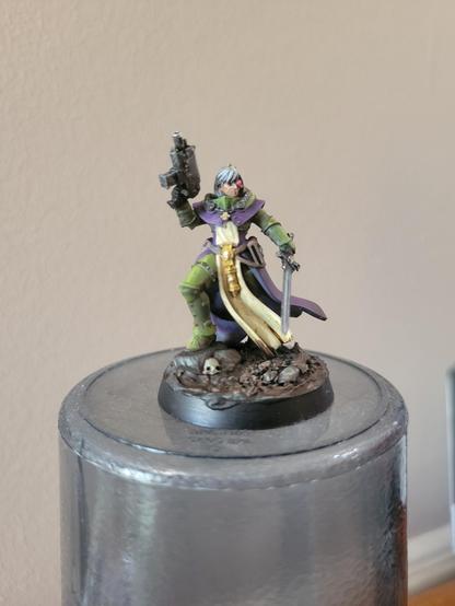 Painted canoness on an upside down cup because finding places to take photos is hard.