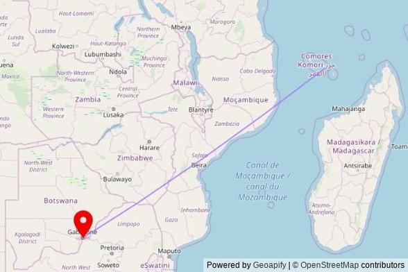 A map showing the great circle route from Comoni in Comoros to a map pin at Christ the King Cath. Cathedral, Independence, Gaborone, Botswana