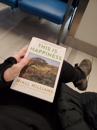 I'm reading This is Happiness by Niall Williams (Bloomsbury Publishing) while sitting in the fracture clinic waiting room. My left hand has a splint on it.
... and, after reading this morning at the fracture clinic, I can now continue reading minus the splint on my rapidly healed broken wrist - yay!