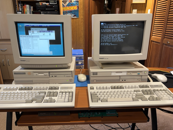 Two computers demonstrating remote boot of OS/2, with the client showing the initial RPL loader screen.