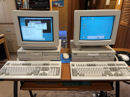 Two computers demonstrating remote boot of OS/2, with the client showing the final OS/2 desktop.