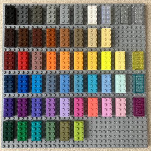 A 32x32 plate filled with 2x4 brick arranged in rows of various colour gradients from dark to light. 