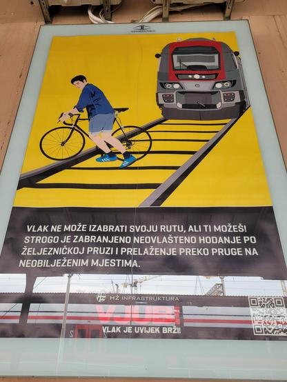 Drawing of a bicycle crossing the tracks too close to a train.