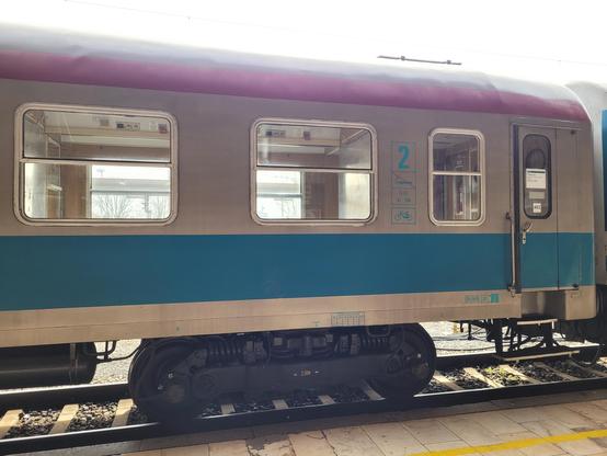 Two windows for the bicycle space in a slovenian carriage. This shows that the platform is more or less at track level.