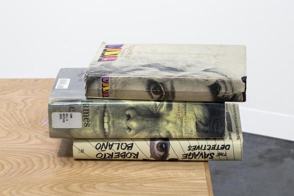 Two Leg Table by Jamie Isenstein, 2016 (shoes, rug, table, books, supports) 