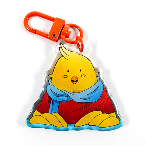 A picture of an acrylic keychain of Gyetang from Tower of God. He has his usual face with his half open beak and is wearing his classic outfit. The rim of the keychain is a gradient going from blue at the bottom to clear at the top. It has a bright orange clasp.
