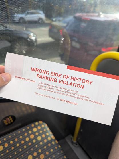 
WRONG SIDE OF HISTORY
PARKING VI0LATI0N 

PAYMEN OPTions. 
1) Get rid Of this swatistcar 
2) Stop Parking here _ You're Not Welcome 
3) Use Your Privilege for Something Other than SUPporting a Nazi 

Tesla-ticket.Com
