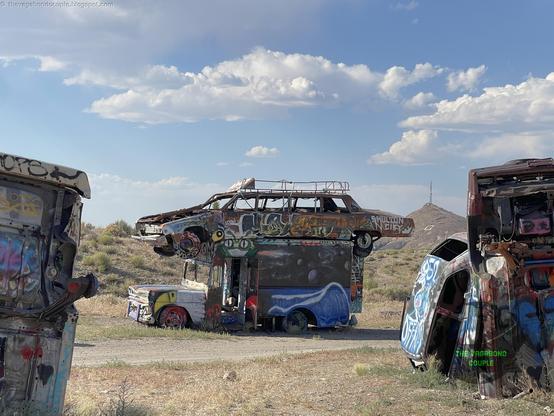 [Episode 10 of #VagabondCouple's #transamerica #mexico 9,000-mile #roadtrip]
INTERNATIONAL CAR FOREST OF THE LAST CHURCH: #surreal scene of cars dug nose-down into the great #mojavedesert of #nevada, artistically decorated. We believe the trailer with #TenCommandments is actually a #church. Another #epic #artgallery in endless #mojave in #WeirdNevada, at abandoned #goldrush #ghosttown of #Goldfield on way from #area51 #extraterrestrial #highway towards #deathvalley. Read more: https://thevagabondcouple.blogspot.com/2024/07/trans-america-overland-road-trip-part-10-extraterrestrial-hwy-area-51-weird-nevada-mojave-desert-art-sculpture-death-valley.html

#travel #travelblogger #traveltheworld #travelingphotographer #travelphotography #travelinspiration #wanderlust #usaroadtrip #roadtripusa #WanderlustUSA #overland #overlanding #deepikapadukone