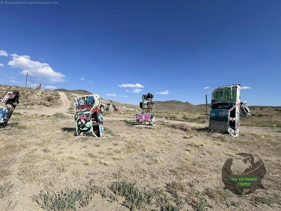 [Episode 10 of #VagabondCouple's #transamerica #mexico 9,000-mile #roadtrip]
INTERNATIONAL CAR FOREST OF THE LAST CHURCH: #surreal scene of cars dug nose-down into the great #mojavedesert of #nevada, artistically decorated. We believe the trailer with #TenCommandments is actually a #church. Another #epic #artgallery in endless #mojave in #WeirdNevada, at abandoned #goldrush #ghosttown of #Goldfield on way from #area51 #extraterrestrial #highway towards #deathvalley. Read more: https://thevagabondcouple.blogspot.com/2024/07/trans-america-overland-road-trip-part-10-extraterrestrial-hwy-area-51-weird-nevada-mojave-desert-art-sculpture-death-valley.html

#travel #travelblogger #traveltheworld #travelingphotographer #travelphotography #travelinspiration #wanderlust #usaroadtrip #roadtripusa #WanderlustUSA #overland #overlanding #deepikapadukone