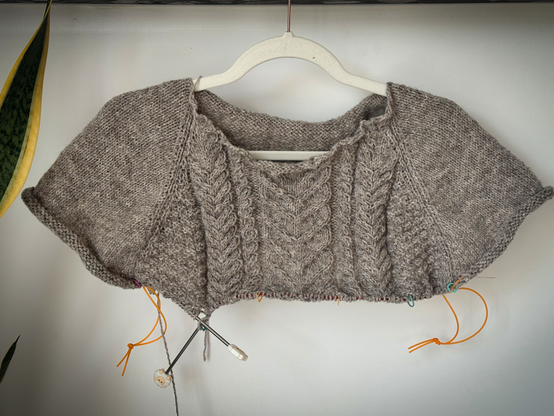partially knitted top down sweater with cables