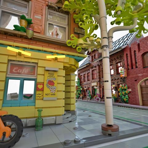 Custom LEGO model of an old yellow painted corner kiosk in Lüneburg, Germany, by Benjamin Albrecht from albrick.de  #lego #legomoc #legofan #legocity #legophotography #albrick #architecture #legomodular #lueneburg #afol