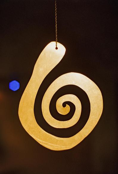 A golden hanging spiral