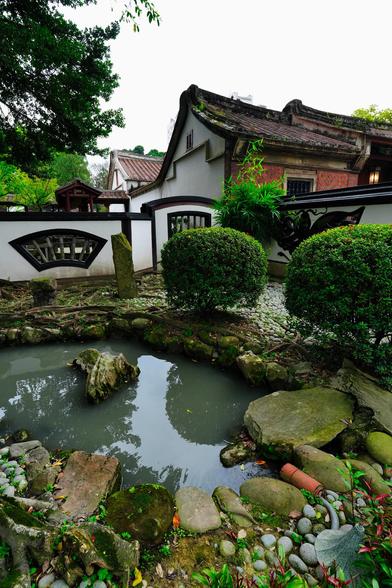 The Lin Family Mansion and Garden: A Historical Gem in Taipei

Nestled in Banqiao District of New Taipei City, Taiwan, the Lin Family Mansion and Garden is one of the most prominent and well-preserved examples of traditional Chinese garden architecture on the island. Often compared to the classical gardens of Suzhou in China, this historical site offers visitors a glimpse into the life of Taiwan's wealthy elite during the Qing Dynasty.

Historical Background
The Lin Family Mansion and Garden was constructed in the mid-19th century by the Lin Ben Yuan family, one of Taiwan’s wealthiest and most influential families at the time. The Lin family originally hailed from Zhangzhou, Fujian Province in mainland China and became successful merchants and landowners after settling in Taiwan. The mansion served not only as a luxurious private residence but also as a venue for important social gatherings and political affairs.

Architectural Features
The estate is a masterpiece of traditional Southern Chinese architecture. The mansion and garden are divided into several sections, including residential quarters, pavilions, courtyards, artificial hills, ponds, and beautifully landscaped gardens. The structures are built using traditional materials such as wood, brick, and tiles, showcasing intricate carvings and delicate craftsmanship.

