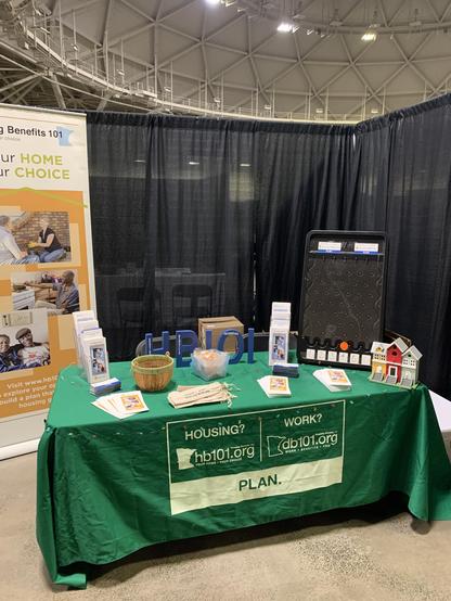 A photograph that shows the table at the HB101 booth at the MSSA conference.