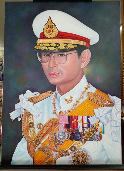 a painting of king rama nine of thailand in full formal regalia, his white shirt with medals all over it, wearing a large white hat, looking to the left, a dark green and gold toned background 