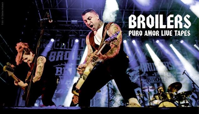 Concerts photo of Broilers Puro Amor Live Tapes. Overview od the stage with singer/guitar player and bass player in action.