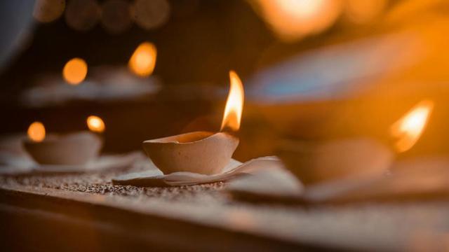 Small clay oil lamp.