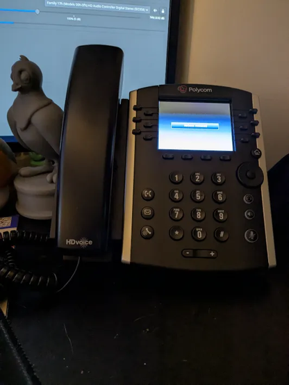 A Polycom VoIP phone sitting on my desk