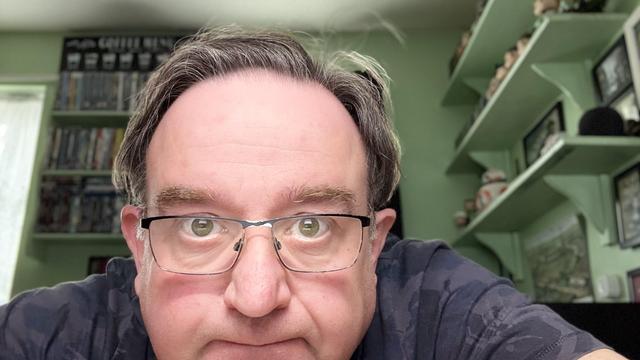 A selfie at my writing desk.