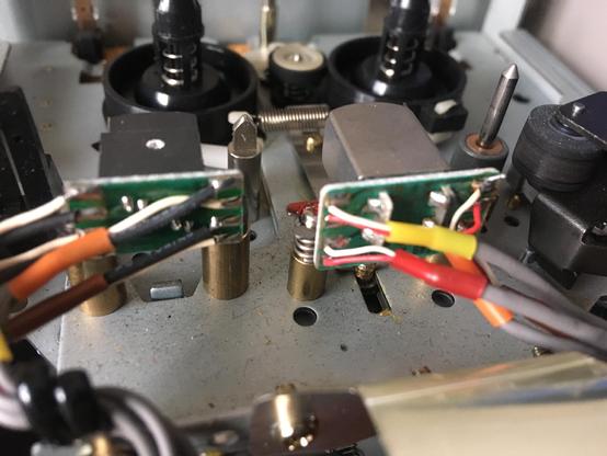 A view from the underside of the erase and record/playback heads, from the tape mechanism of a Tascam 464 multitrack cassette recorder.