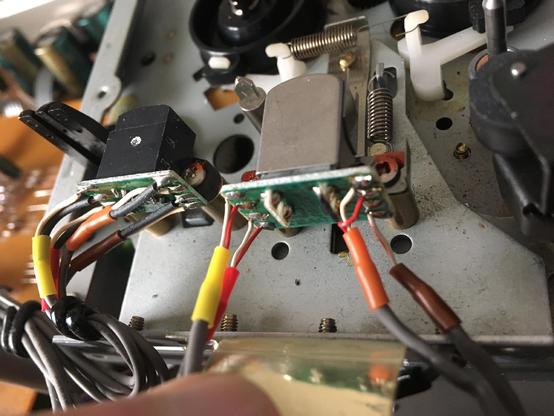 A view from the underside of the erase and record/playback heads, from the tape mechanism of a Tascam 464 multitrack cassette recorder.