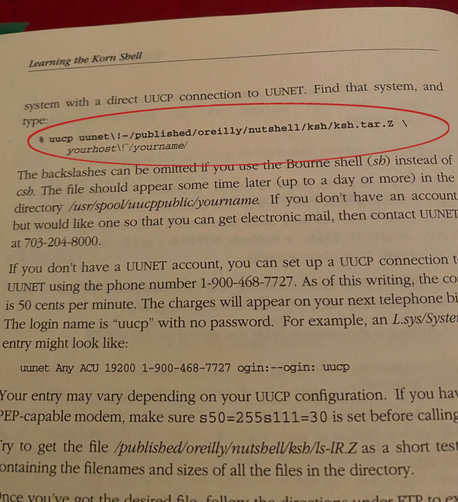 A page screenshot from O'Reilly Media's "Learning the Korn Shell" by Bill Rosenblatt. The page shows a command example of how you would've acquired a copy of the Korn Shell over UUCP via the old internet service provider UUNET (long since defunct, ergo the command is useless today, since UUNET no longer exists and this book was published in 1993). Around the command, I have edited a red oval to highlight and draw more attention to it (the YouTuber method) in GIMP.