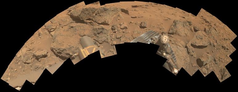A red toned mosaic documenting the Sally's Cove outcrop.