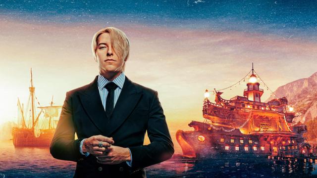 Man sieht Sanji, aus der Live Action Serie One Piece.
Im Hintergrund sind Schiffe zu erkennen