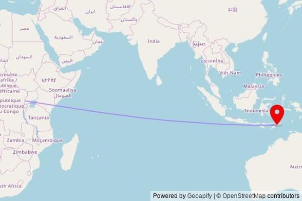 A map showing the great circle route from Kahendero in Uganda to a map pin at Igreja Hato-Udo KTM, Estrada Cassa - Hatu-Udo, Groto, East Timor