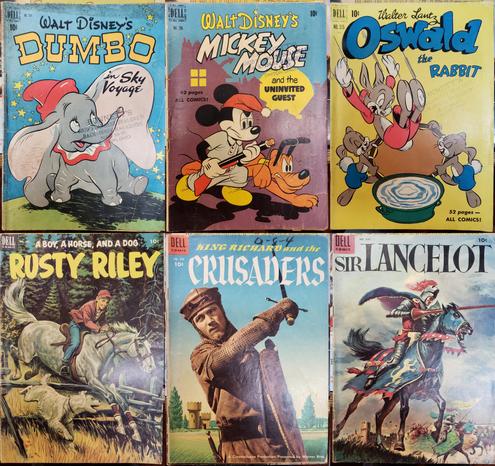 A composite photo of six Golden Age vintage comic books from the Dell Four Color series, as follows: 

234 Walt Disney's Dumbo in "Sky Voyage". Has Bonnett's store stamp and heavy dust shadow along top and spine edges.

286 Walt Disney's Mickey Mouse and the Uninvited Guest. 52 pages, all comics! Has Bonnett's store stamp.

315 Walter Lantz Oswald the Rabbit. 52 pages–all comics! Has Bonnett's store stamp.

451 Rusty Riley. A boy, a horse, and s dog.

588 King Richard and the Crusaders. A CinemaScope production, presented by Warner Bros. Movie tie-in. Arrival date written above title in grease pencil.

606 Sir Lancelot (1954).