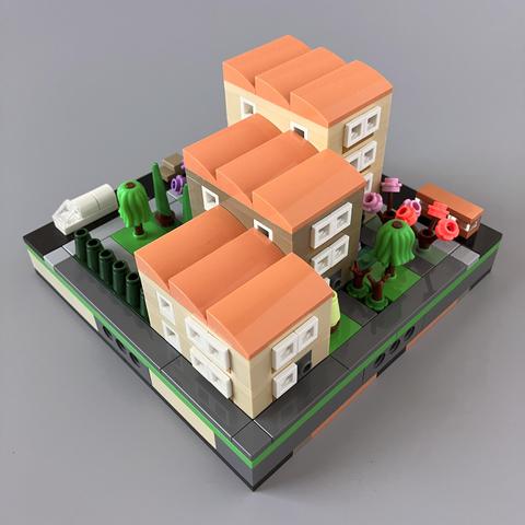 At the rear, the smallest block sits next to the access alleyway